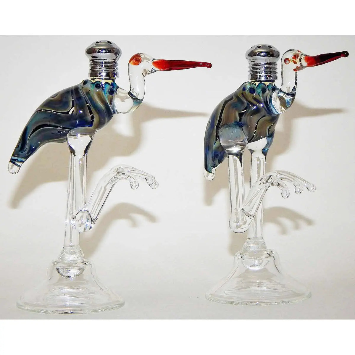 http://www.sweetheartgallery.com/cdn/shop/products/Four-Sisters-Art-Glass-Blue-Heron-Blown-Glass-Salt-and-Pepper-Shaker-107-Artistic-Handblown-Art-Glass_6e533904-a6f7-434d-aa79-0bafe8b10080_1200x1200.jpg?v=1589924281