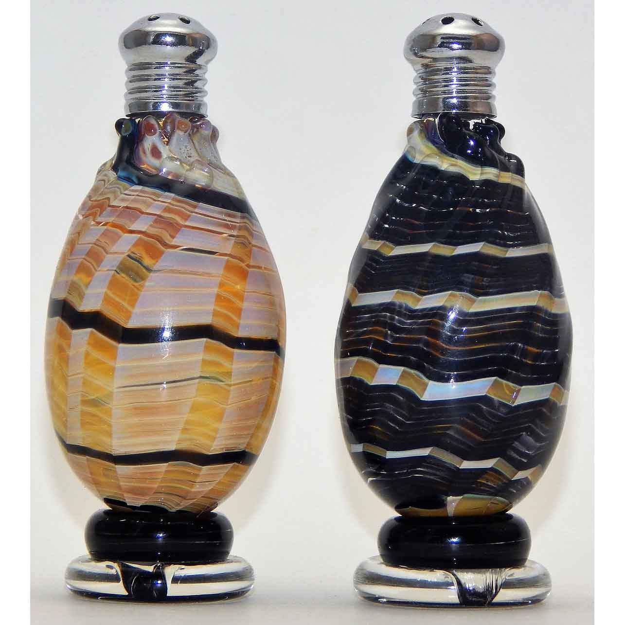 https://www.sweetheartgallery.com/cdn/shop/products/Four-Sisters-Art-Glass-Black-and-Cream-Spiral-Blown-Glass-Salt-and-Pepper-Shaker-208-Artistic-Handblown-Art-Glass.jpg?v=1589924286